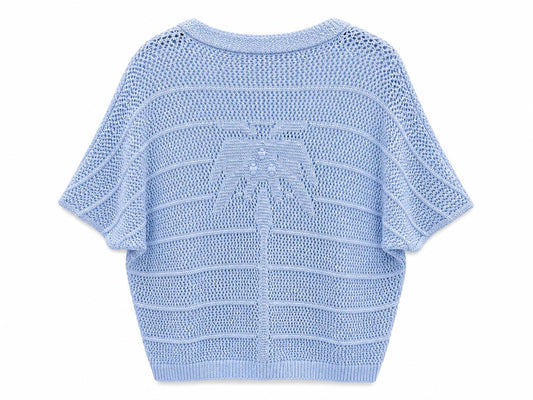 Chaleco palmeras azul
