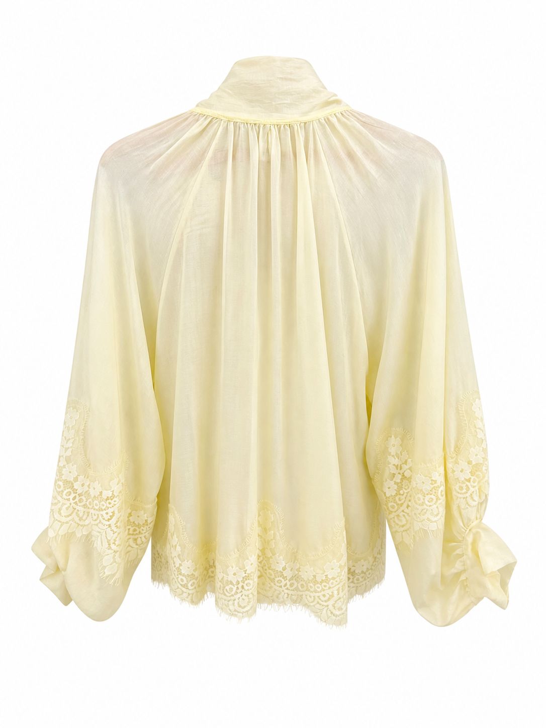 Camisa amarilla lazada con encajes